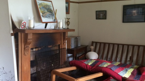 Inside the damaged cottage, where the water struck almost two metres high.